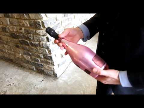 Opening a bottle of Armand de Brignac Champagne