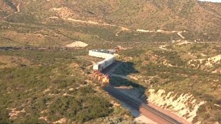 preview picture of video 'Two BNSF Hotshot Trains Pass Hill 582 in Cajon Pass HD'