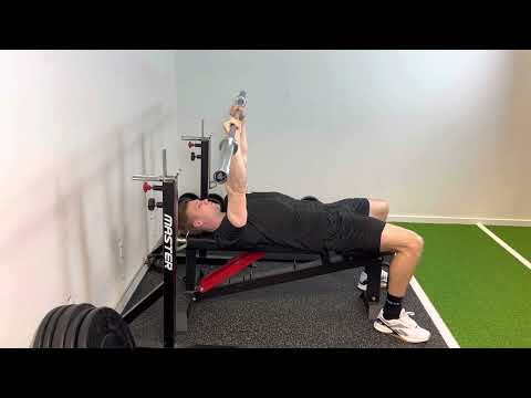 Exercice Développé couché prise sérrée vers le menton avec barre