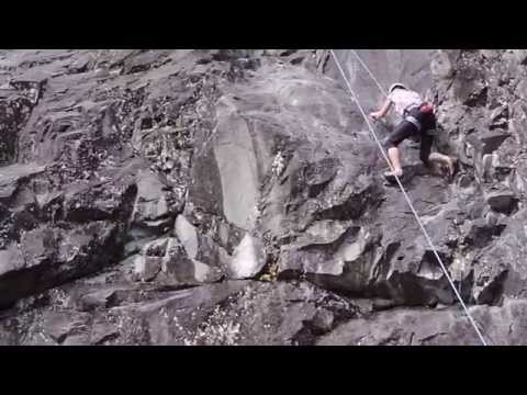 Midori, on a 5.9 route, belayed by Michael