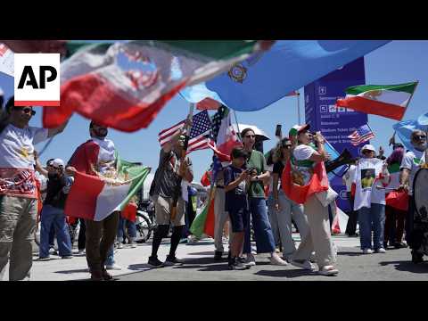 Scuffles break out on the street as Iran plays Belgium in the World Cup