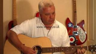 Video thumbnail for Review of the Martin DM Dreadnought Acoustic Guitar by imusoreviews