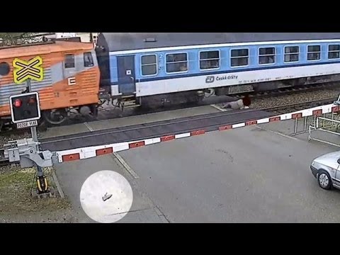 Train Hits Man and Knocks His Shoe off at Crossing