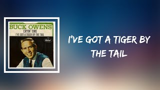 Buck Owens - I&#39;ve Got A Tiger By The Tail (Lyrics)