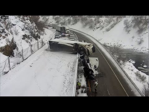 I-70 closed at Glenwood Canyon as Semi truck dangles off westbound side