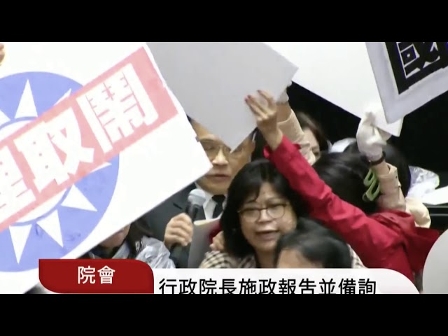 Pig guts fly in Taiwan parliament protest