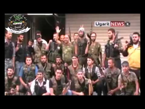 قائد كتيبة فجر حلب عبد السلام منغاني أبو علاء يلقي قصيدة في إحدى جبهات القتال في مدينة حلب