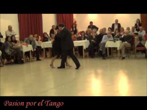  María del Carmen Romero  and  Jorge Dispari  are  dancing  to  the  tango  "  Oigo Tu Voz  "