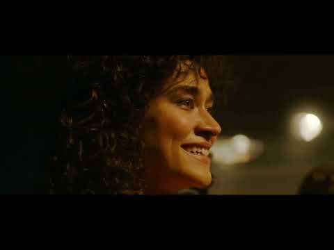 Love Lies Bleeding trailer close-up suggesting intense synth score under dialogue