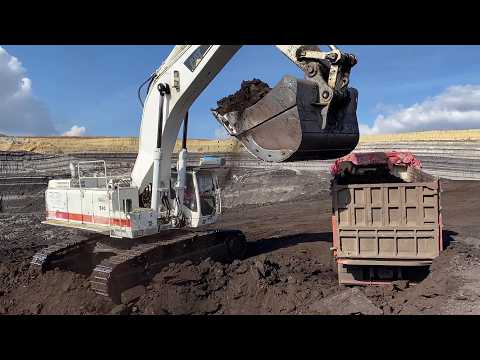 Caterpillar 385C Excavator Loading Coal Onto 4 Axle Trucks - Interkat SA