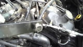 Installing the, drive belt on the Lincoln LS 2001
