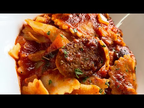 Cappellacci Pasta roasted garlic red sauce with hot sausage 🦢
