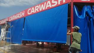 Cortina enrollable con mecanismo giratorio manivela