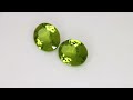 Coppia di Peridoti, taglio ovale, 7.24 ct tot. Video 1