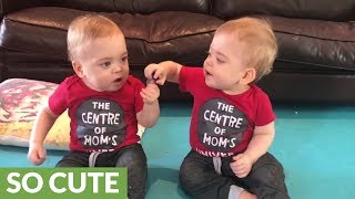 Identical twins each want the other&#39;s pacifier