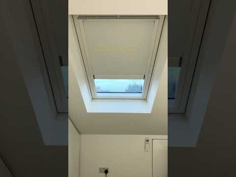 Velux solar powered motorised roller blind.