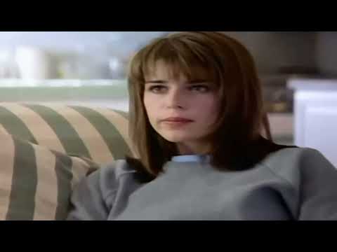 1996 Scream trailer still with Ghostface in a doorway and a ringing phone