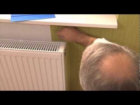 eurowalls - Hanging of wallpapers at heater