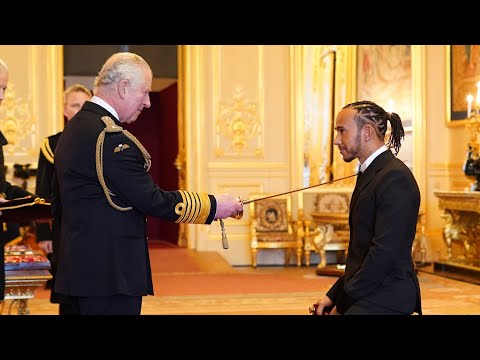 Sir Lewis Hamilton F1 star knighted by Prince Charles days after missing out on record eight title.