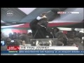 Raila Odinga performs a song to praise the Late Otieno Kajwang