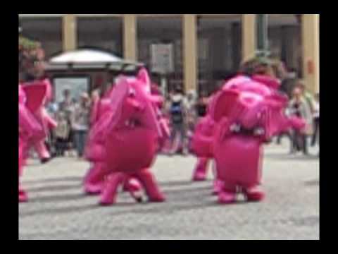 pink elephants dancing in a square of prague