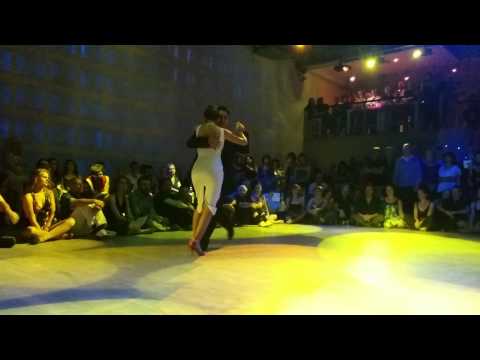  Carlos Espinoza  and  Noelia Hurtado Pitruzzella  are  dancing  to  "  Cuando El Amor Muere  "  by  Carlos di Sarli