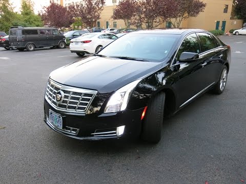 Cadillac XTS 2014 на русском