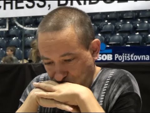 A 8.7. IM  Mikhail Mozharov -  GM Philipp Schlosser  ½ - ½