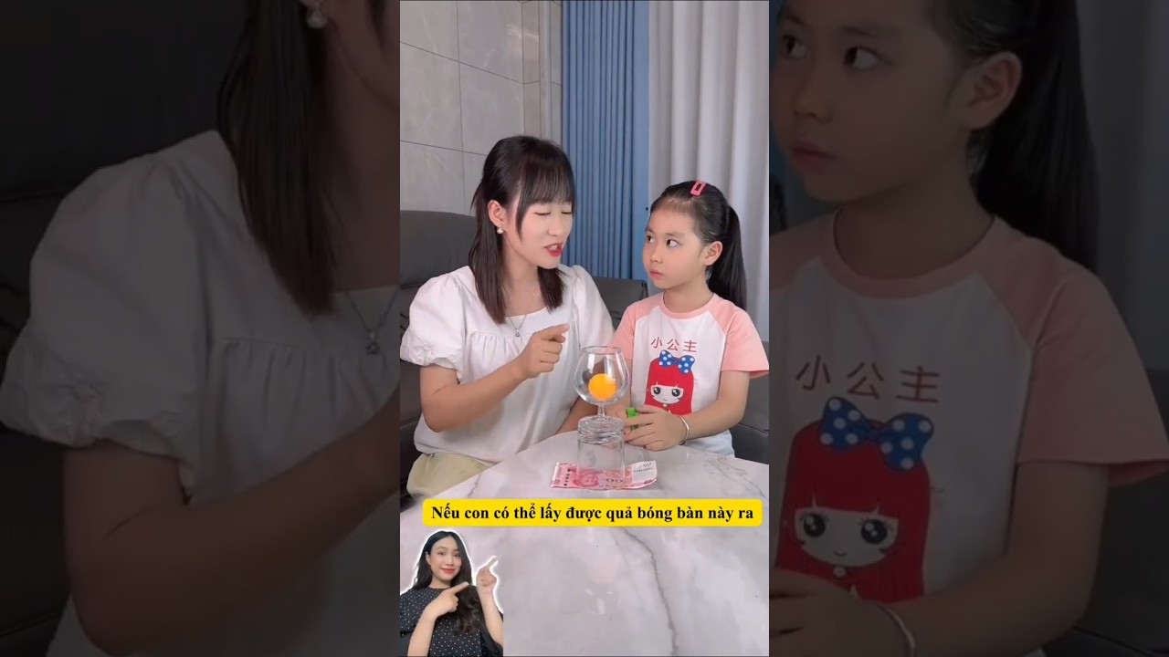 Lấy quả bóng bàn ra khỏi ly mà không dùng tay