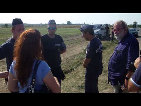 Hungarian Police Detain Refugees, Refuse Media Questions