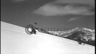 Men demonstrate the snow plow position and the slowing down of the speed while sl...HD Stock Footage