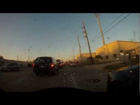 Guy in car spits on motorcyclist