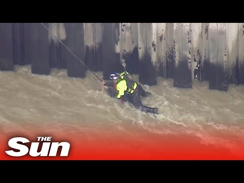Helicopter rescue team pull man from swollen Los Angeles river just in time
