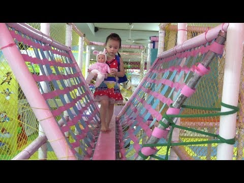 Indoor playground for kids with little girl and baby doll at play center - Abckidtv Misa Video