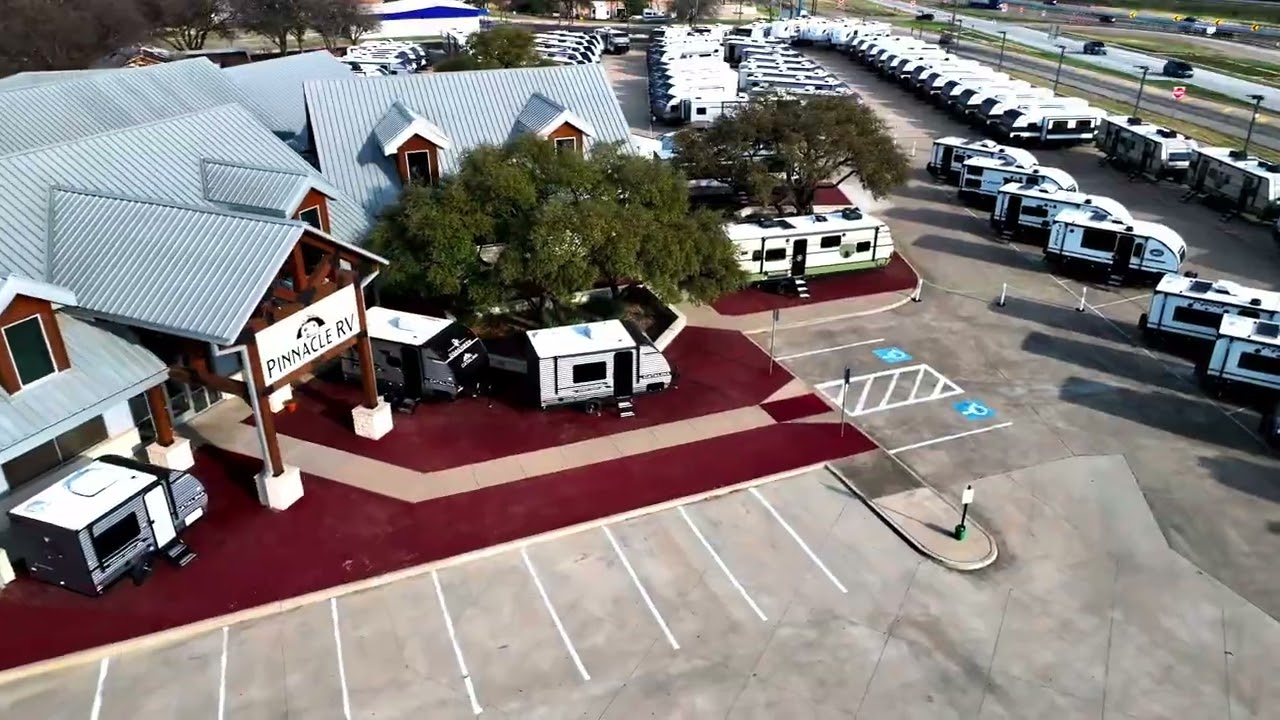 A photo of this 2027 Coachmen Rv Catalina Legacy Edition 343BHTS 2 Queen Beds