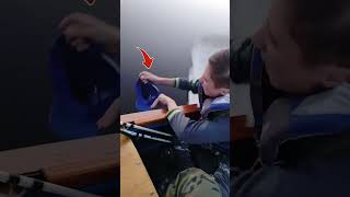 Why is this man holding a cap when they are cruising on the lake??? #viral #shortsfeed