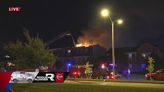 Crews fight apartment building fire on Chouteau Ave