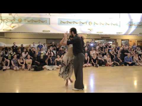 Pablo Rodriguez  and  Corina Herrera  are  dancing  to  the  tango  "  Pocas Palabras  "  by  Ricardo Tanturi  at  Portland tango festival  in  2015