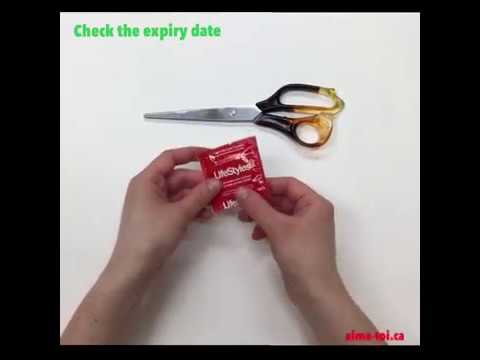 Make a sheet of latex out of a condom with scissors