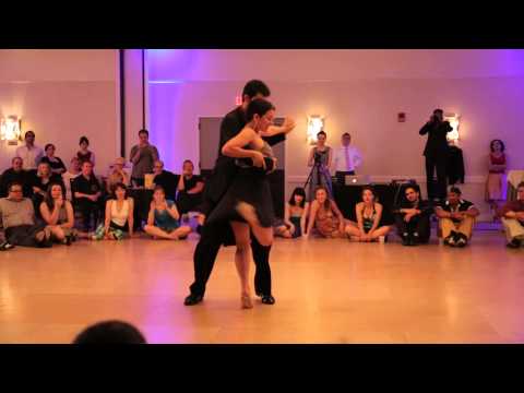  Dana Frigoli  and  Adrian Ferreyra  are  dancing  to  the  nontraditional song  "  Balada por un loco  "  by  Astor Piazzolla