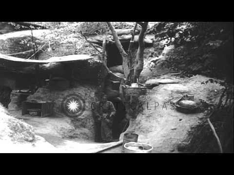 Civilians hide in underground houses due to the terror of the communists in Quemo...HD Stock Footage