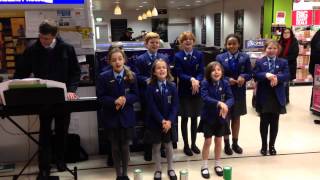 Choir singing at the Coop - 12 days of Christmas - with actions!