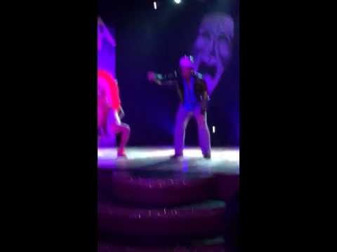 Larry dances with the Village People