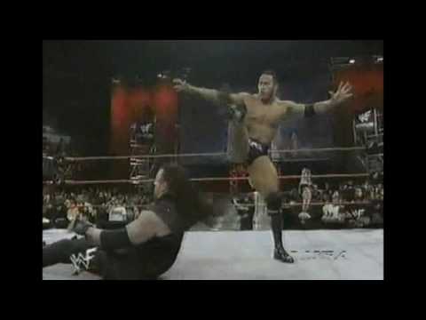 THE ROCK DOES A FUNNY PEOPLES ELBOW ON THE UNDERTAKER