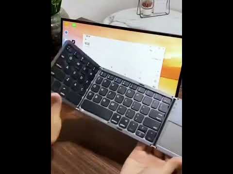 фото складная bluetooth клавиатура vontar с тачпадом 0