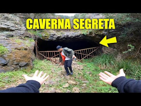 EXPLORING A HUGE SECRET CAVE - WE FIND A PERSON LIVING THERE!