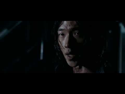 Trailer montage: chain-blade whips through rain, rooftops blur, and a synth kick slams into a downbeat