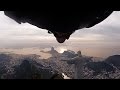 Wingsuit Flight Under Arm of Christ Statue in Rio de ...
