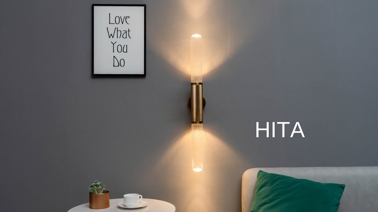 Applique tendance dorée double éclairage LED en métal et verre - Hita