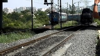 preview picture of video 'Two express trains in opposite directions skipping Hi-tech City station at good speed'